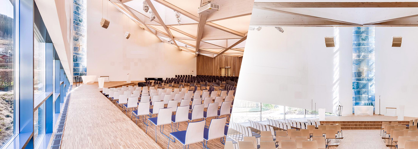 Световой ориентир в интерьере новой лютеранской церкви - ажурная стеклянная колонна за алтарем храма